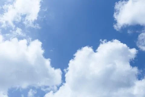 White clouds in the blue sky Stock Photos