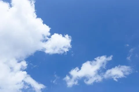 White clouds in the blue sky Stock Photos