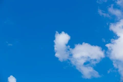 White clouds in the blue sky Stock Photos