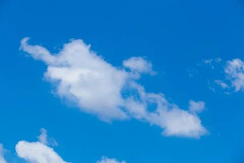 White clouds in the blue sky Stock Photos