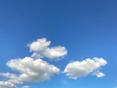 White clouds in the blue sky Stock Photos