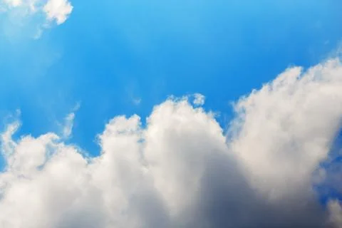 White clouds on the blue sky Stock Photos
