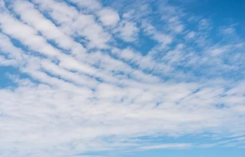 White Clouds in a Blue Sky Stock Photos