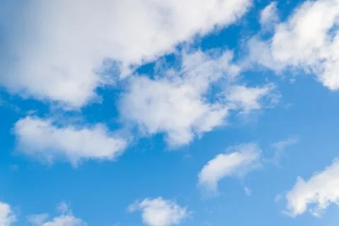 White clouds on a blue sky Stock Photos
