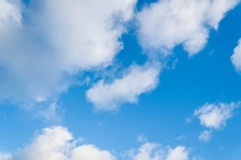 White clouds on a blue sky Stock Photos