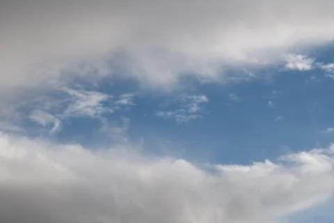 White clouds on a blue sky  Stock Photos