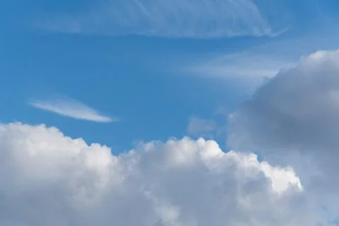 White clouds on a blue sky  Stock Photos
