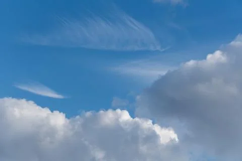 White clouds on a blue sky  Stock Photos