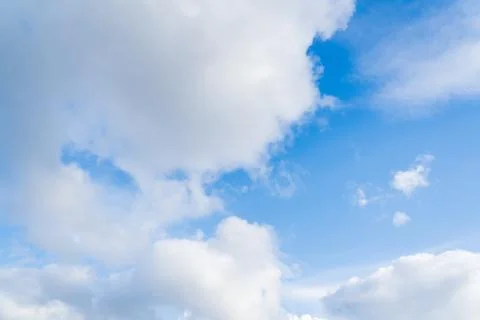 White clouds on a blue sky  Stock Photos