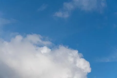 White clouds on a blue sky  Stock Photos