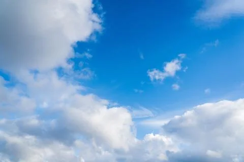 White clouds on a blue sky Stock Photos