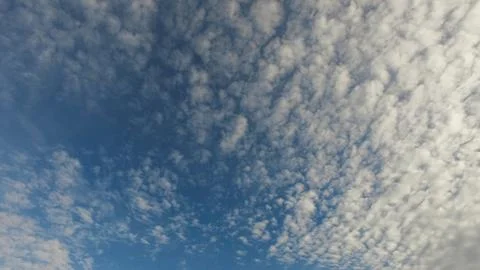 White clouds on a blue sky  Stock Photos