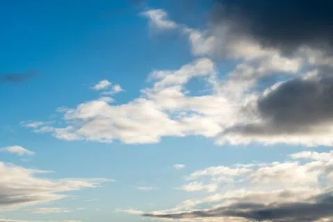 White clouds on a blue sky Stock Photos