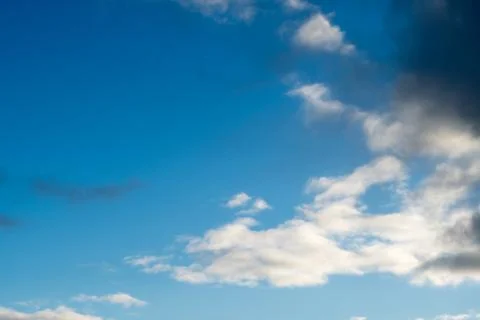 White clouds on a blue sky Stock Photos