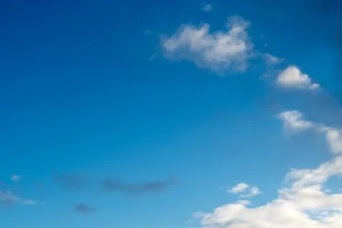 White clouds on a blue sky Stock Photos