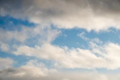 White clouds on a blue sky Stock Photos