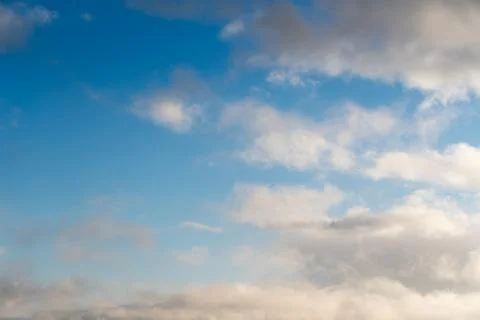 White clouds on a blue sky Stock Photos