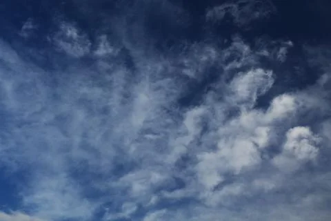 White clouds in the blue sky Stock Photos