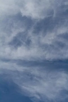 White clouds on a blue sky Stock Photos