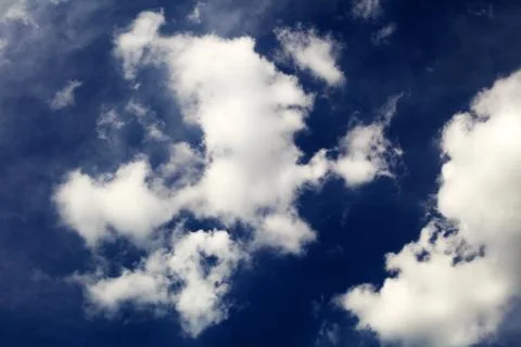 White clouds in the blue sky Stock Photos