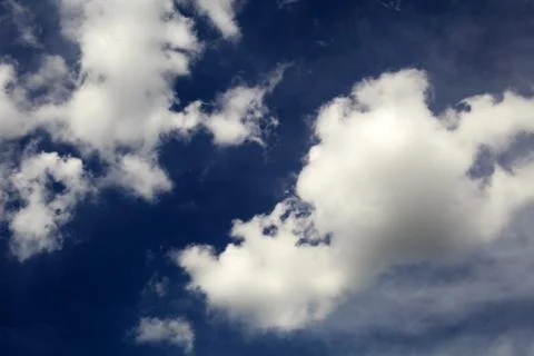 White clouds in the blue sky Stock Photos