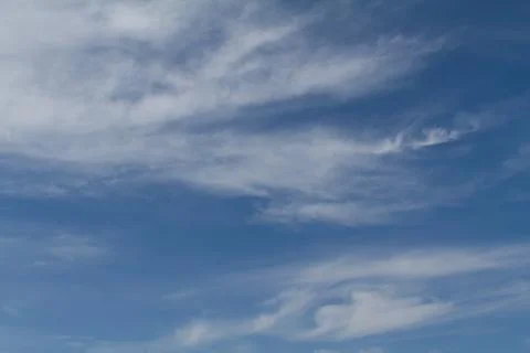 White clouds in a blue sky Stock Photos
