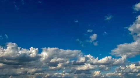 White clouds on a blue sky Stock Photos