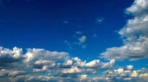 White clouds on a blue sky Stock Photos