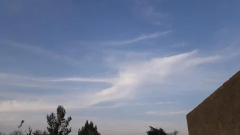 The white clouds on the blue sky Stock Photos