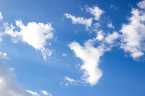 White clouds on blue sky Stock Photos