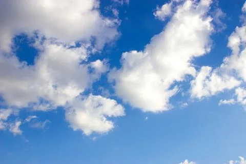 White clouds on blue sky Stock Photos