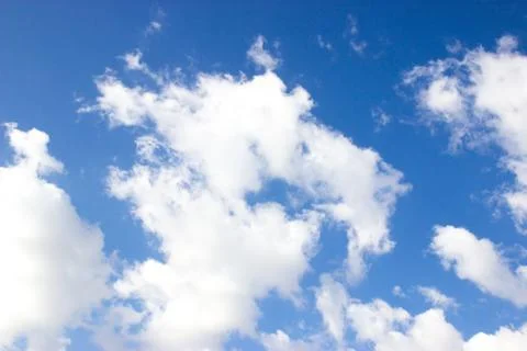 White clouds on blue sky Stock Photos