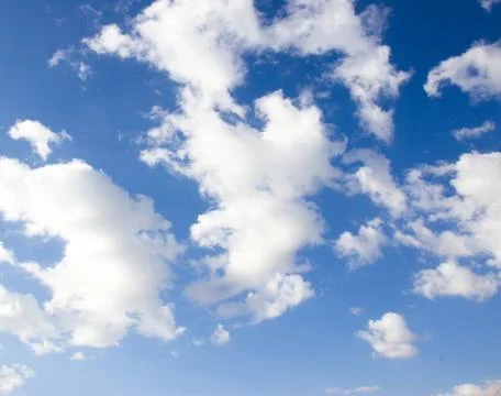 White clouds on blue sky Stock Photos