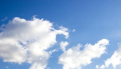 White clouds on blue sky Stock Photos