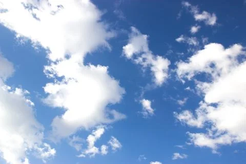 White clouds on blue sky Stock Photos
