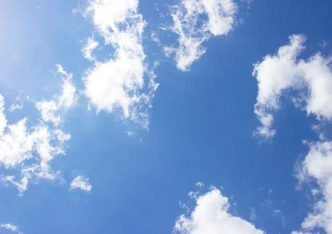 White clouds on a blue sky Stock Photos