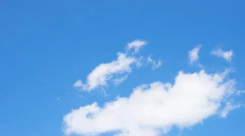 White clouds on a blue sky Foto stock