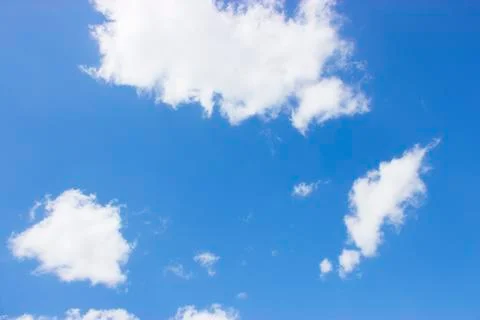 White clouds on a blue sky Stock Photos