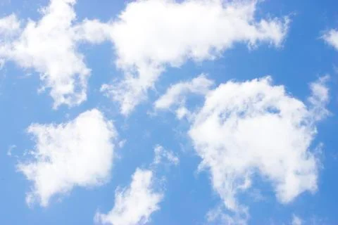 White clouds on a blue sky Stock Photos