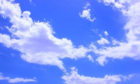 White clouds on a blue sky Stock Photos