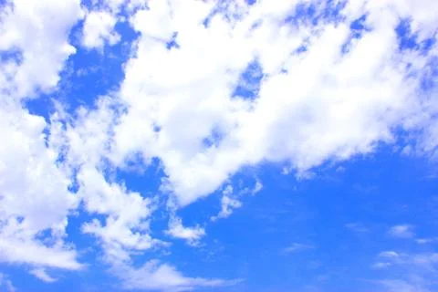 White clouds on a blue sky Stock Photos