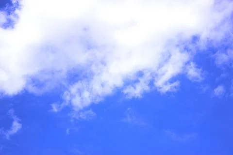 White clouds on a blue sky Stock Photos