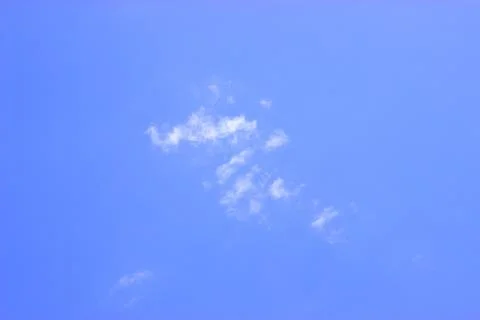 White clouds on a blue sky Stock Photos