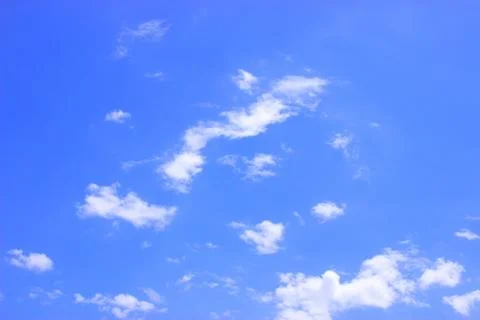 White clouds on a blue sky Stock Photos