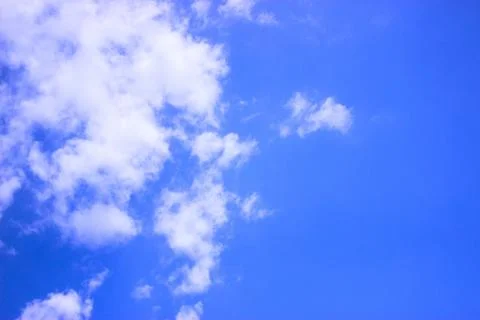 White clouds on a blue sky Foto stock