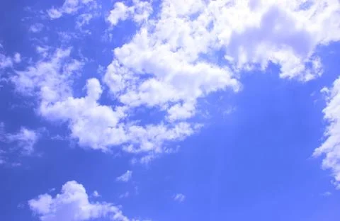 White clouds on a blue sky Stock Photos