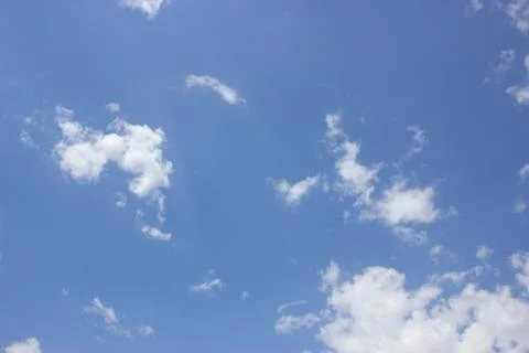 White clouds on a blue sky Stock Photos