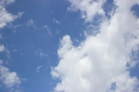 White clouds on a blue sky Stock Photos