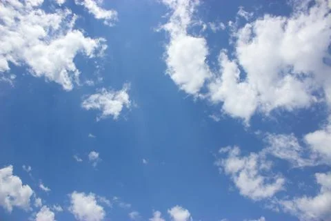 White clouds on a blue sky Stock Photos