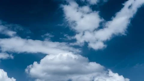 White clouds in the blue sky Stock Photos
